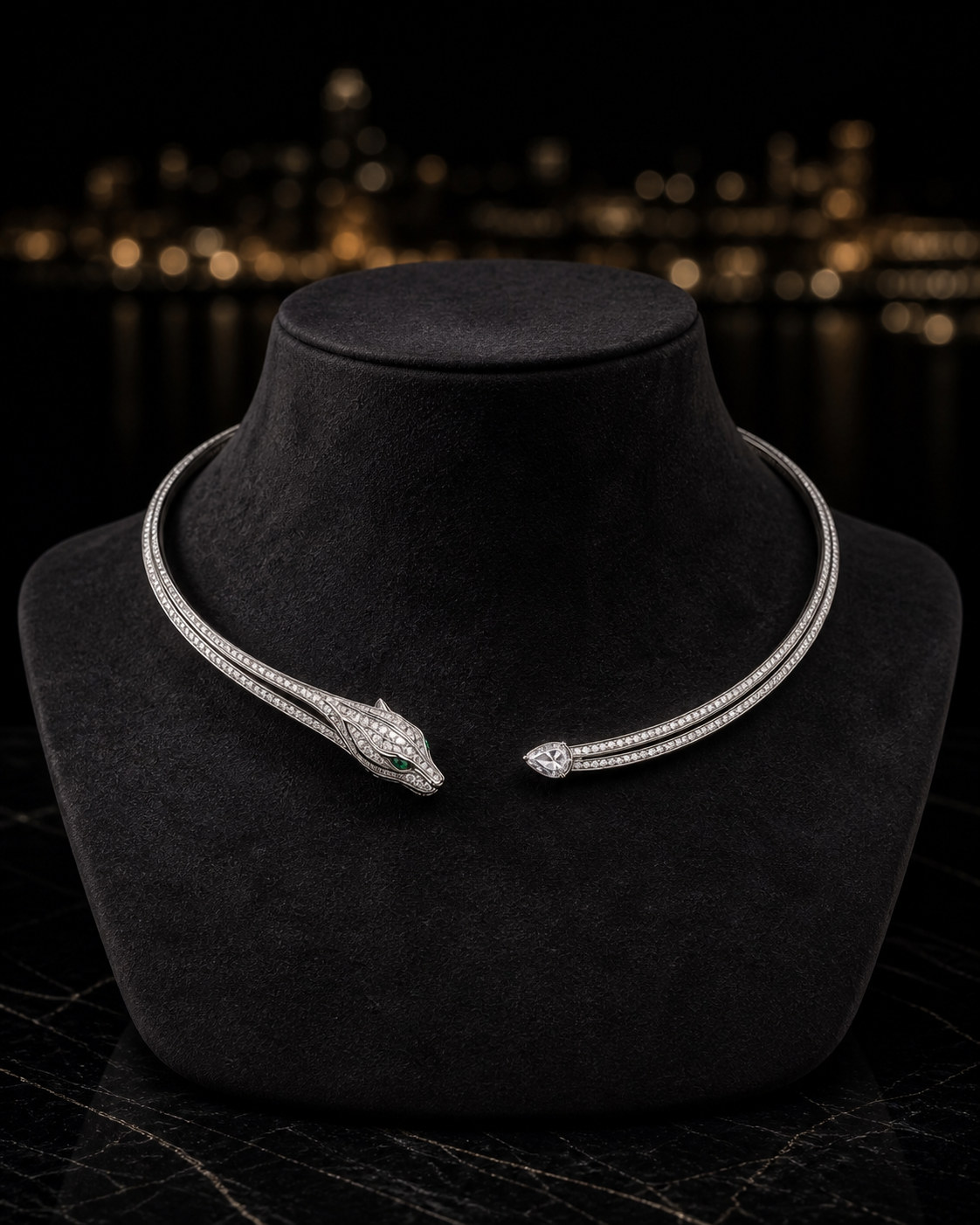 The Trace Collar in rhodium-plated white gold, a fine collar line meeting a small pavé panther head with emerald eyes, shown on its own.